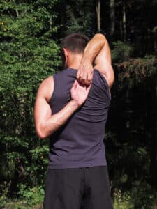 overhead tricep stretch to prevent sports injuries