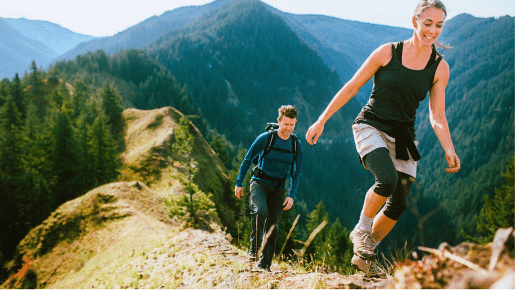 hikes up a rocky trail on a mountain ridge